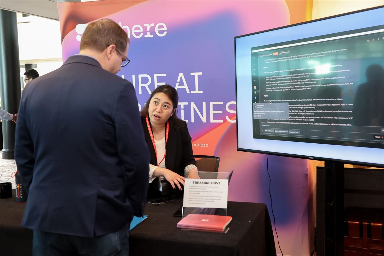 Sponsor booth conversation
